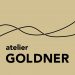 Atelier Goldner logo on beige background